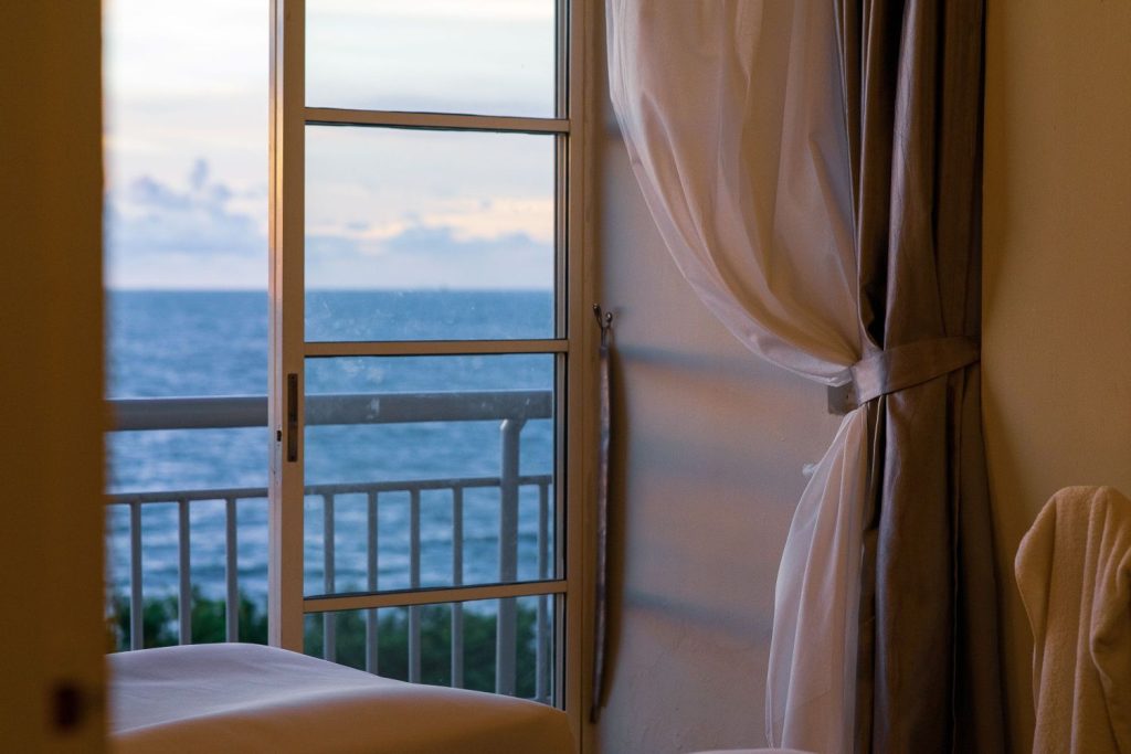 Window of a seaside apartment open