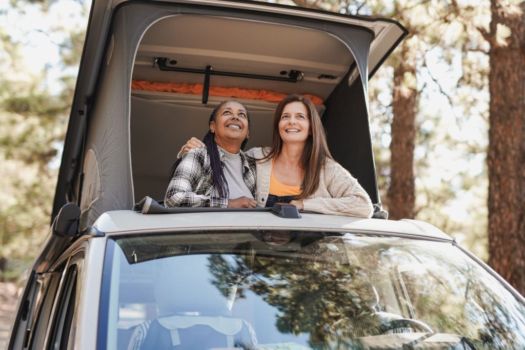 two girls in a camping car, theiy have chosen this travel option