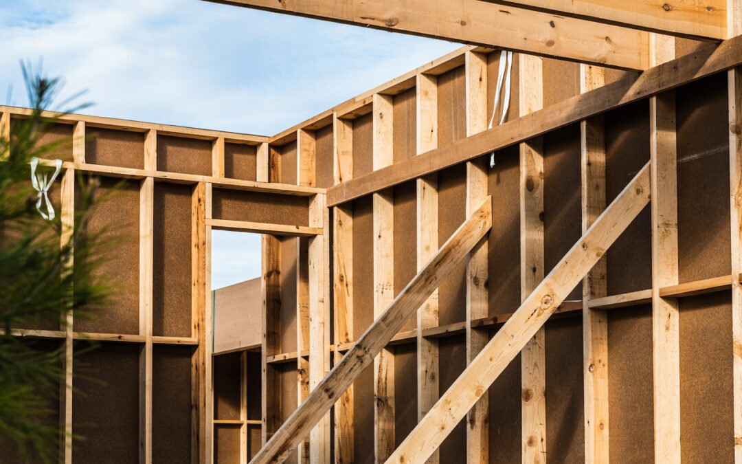 Wood planks s for walls and beams in the construction of a new sustainable wooden house.